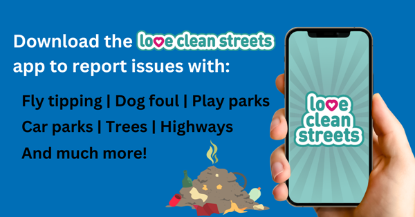 Download the Love Clean Streets app to report issues with fly tipping, dog foul, play parks, car parks, trees, highways and much more! A pile of garbage is shown and someone holds a mobile phone displaying the Love Clean Streets logo.